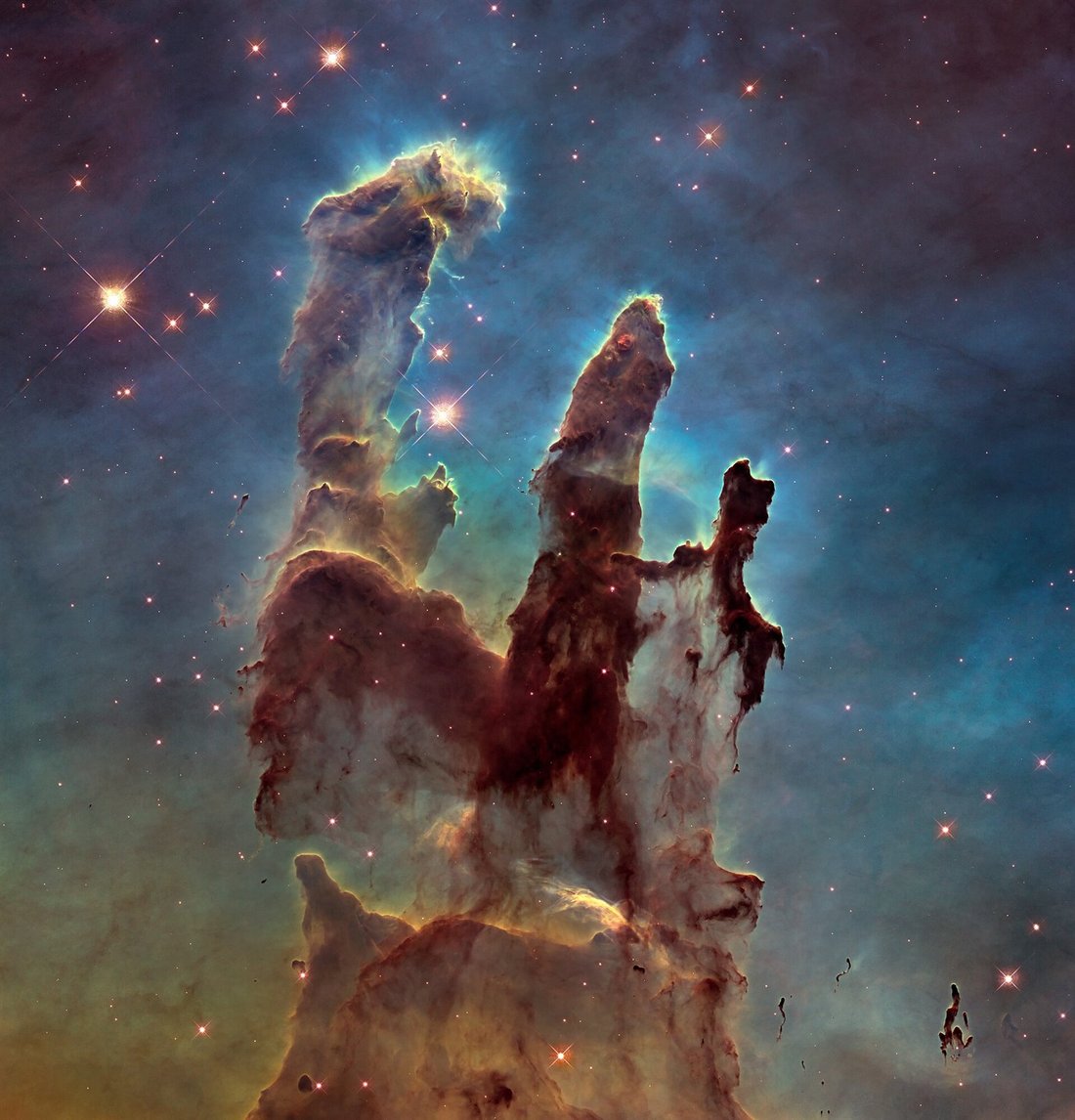 Yildizlararasi gaz ve toz bulutlari (Pillars of Creation)